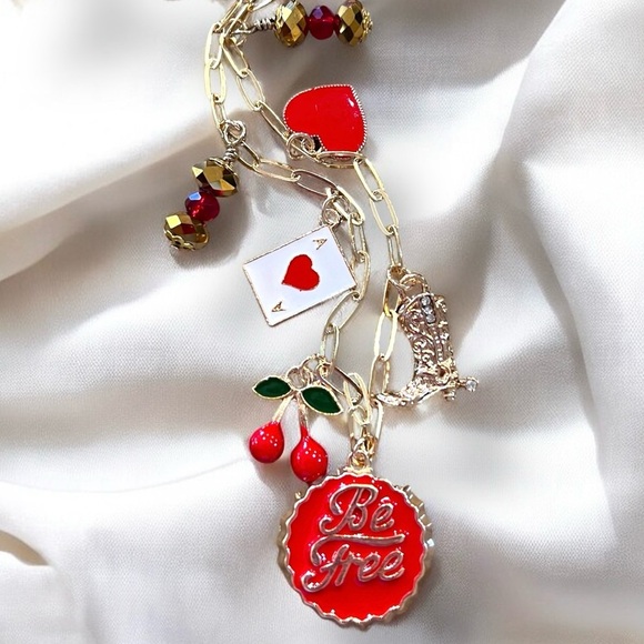 Gold toned dainty and fun Charm Necklace cherries, heart, boot and crystals - Picture 14 of 17